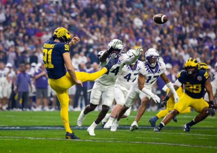 Dec 31, 2022; Glendale, Arizona, USA; Michigan Wolverines punter Brad Robbins (91) against the TCU Horned Frogs during the 2022 Fiesta Bowl at State Farm Stadium. Mandatory Credit: Mark J. Rebilas-USA TODAY Sports